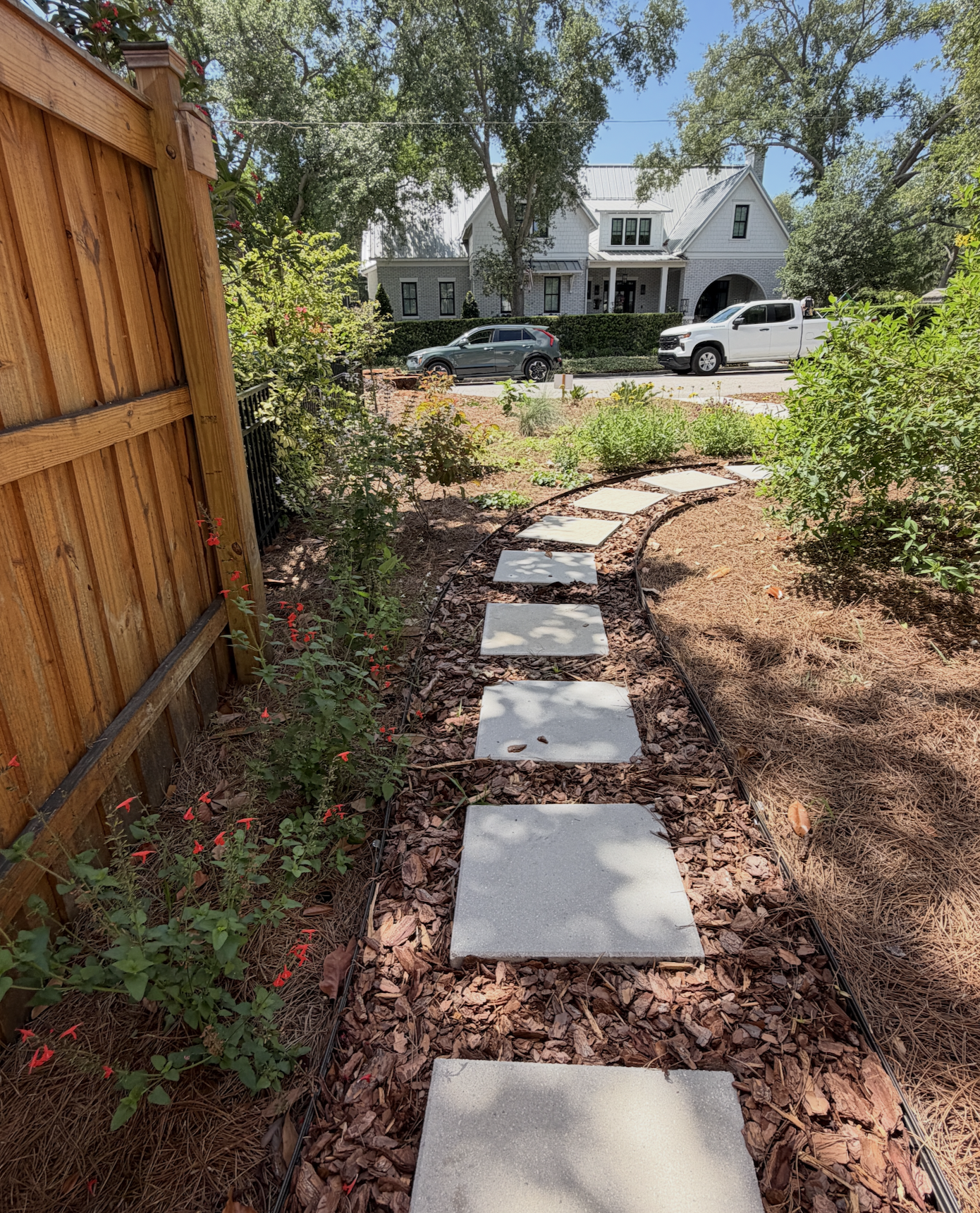 Front yard landscape transformation, curb appeal, seasonal flowers, florida native plants, pine straw, ground-cover, pathway