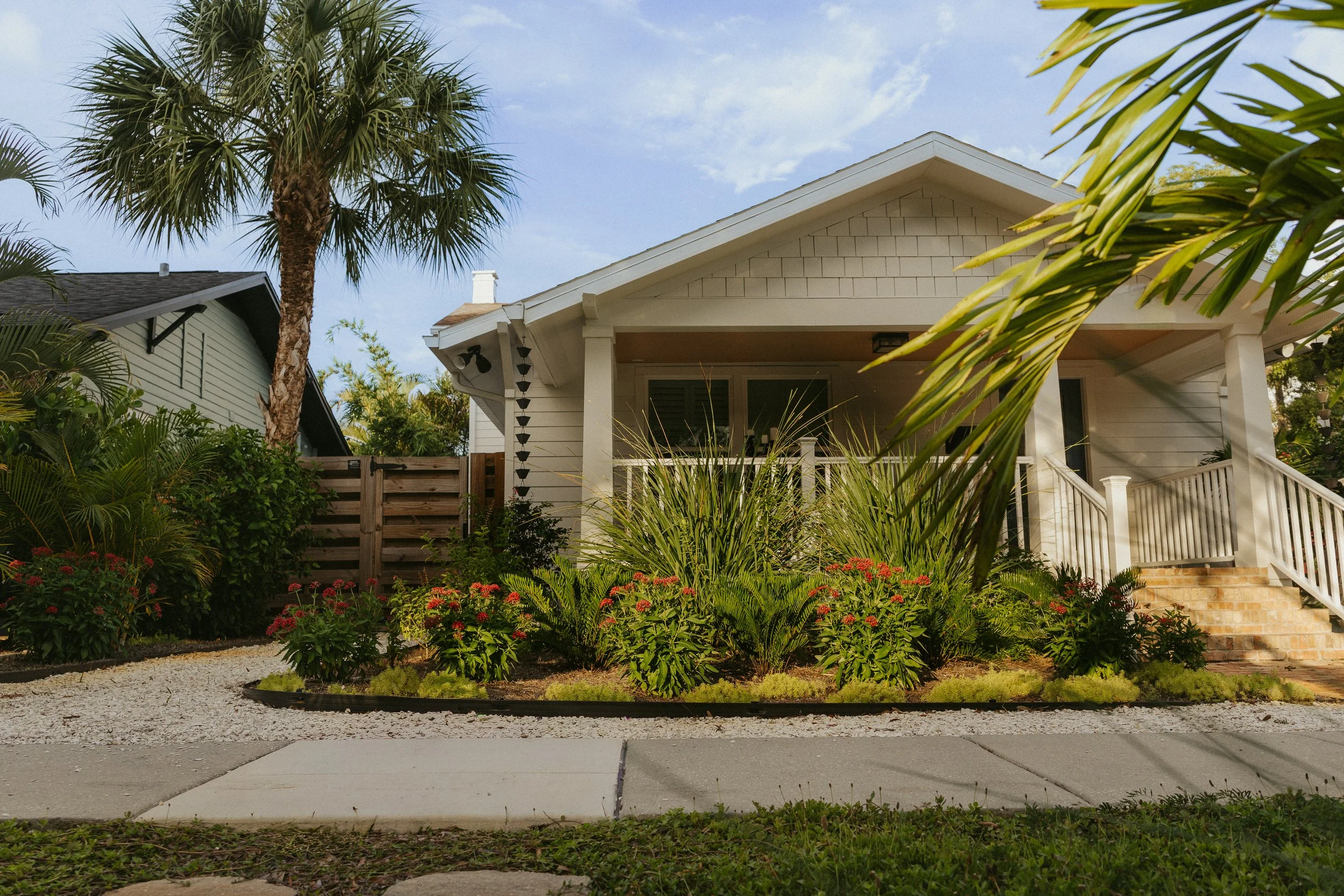 Front yard landscape with a mix of Florida native and friendly plants, in Historic Kenwood, Saint Petersburg, FL, Pinellas County