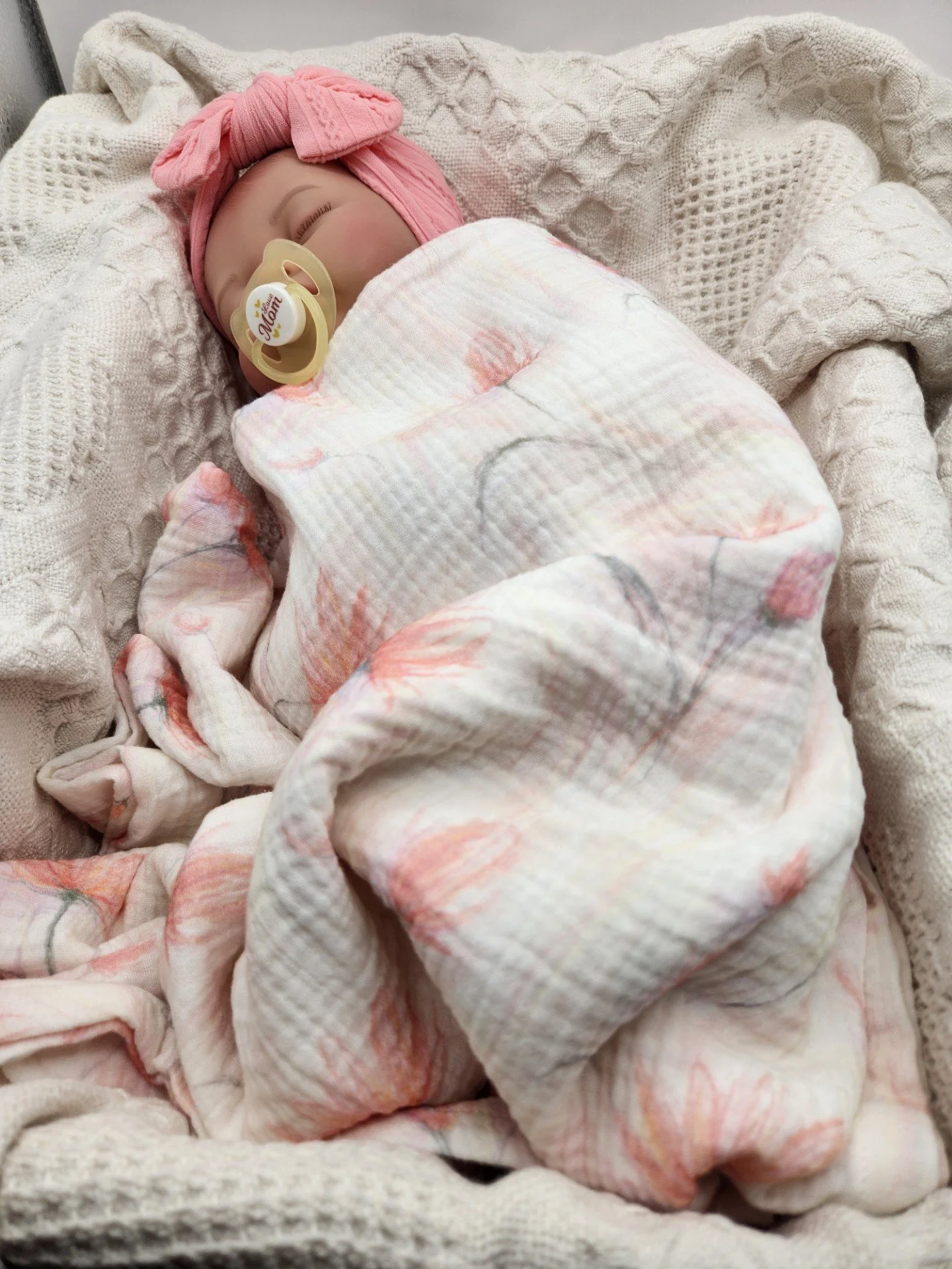 Pink_watercolor_swaddle_crib.jpg