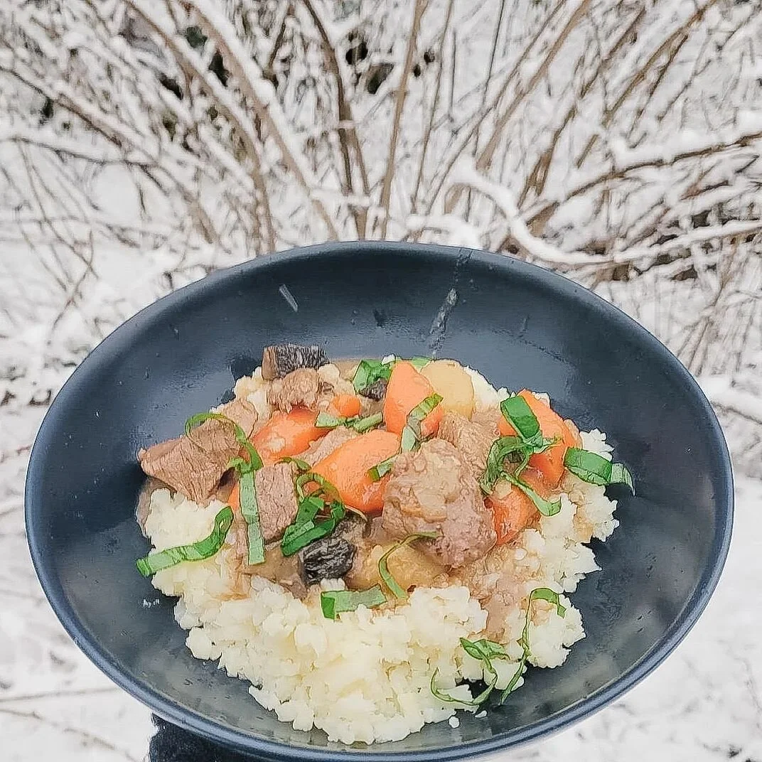 As the snow swirls around our cozy house it's the perfect day for stew. 

Today's recipe is Beef stew with Cauliflower Mash.

1 pound local beef cubed
3 large carrots chopped
2 Parsnips chopped
Beef Broth (I bought mine at the local store Kiwi Cafe)
