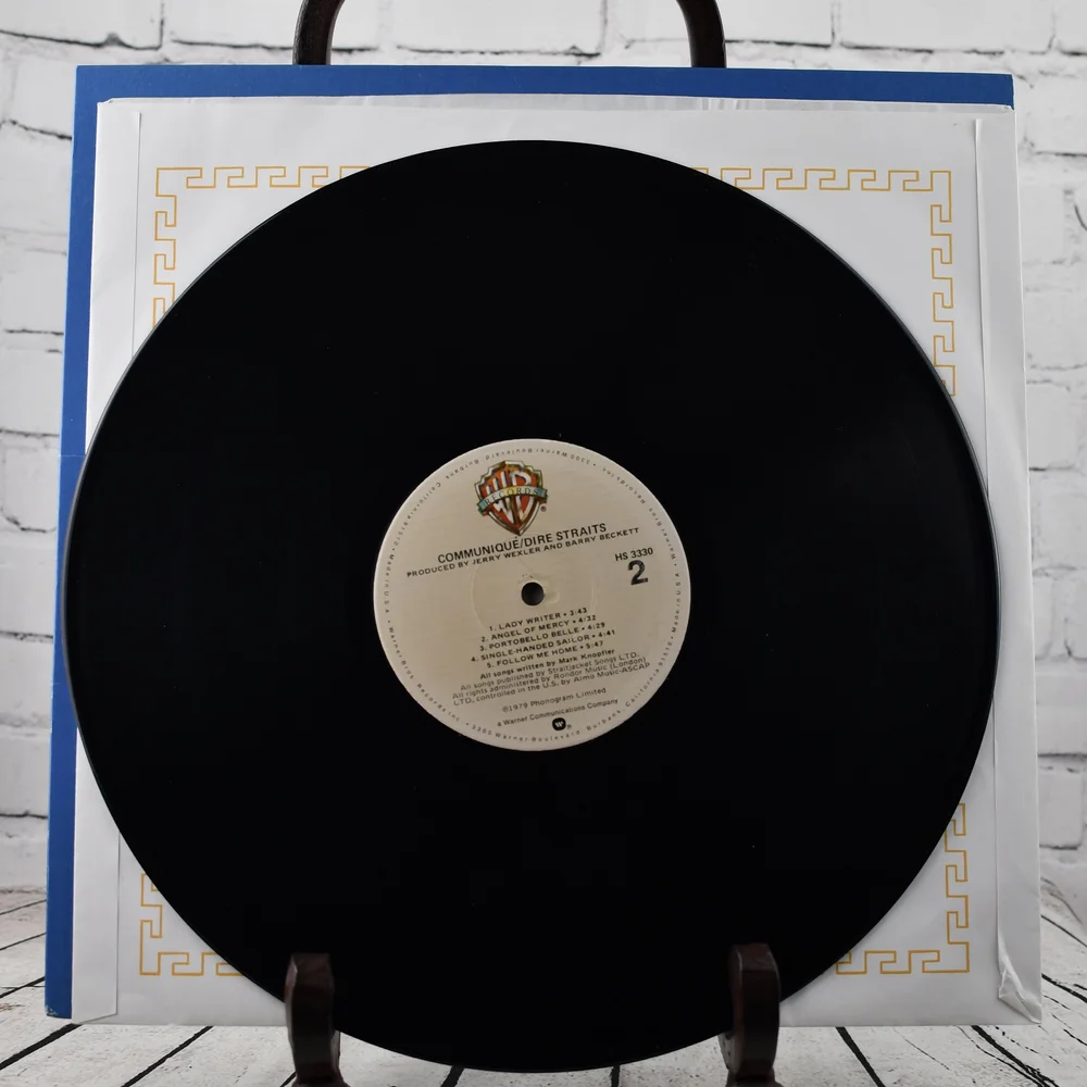 Dire Straits – Communiqué, 12