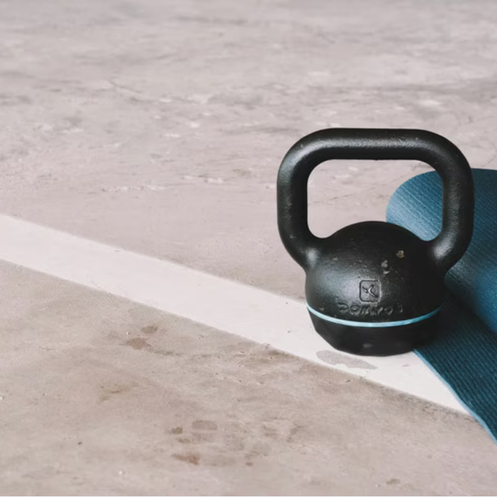 kettle bell on yoga mat