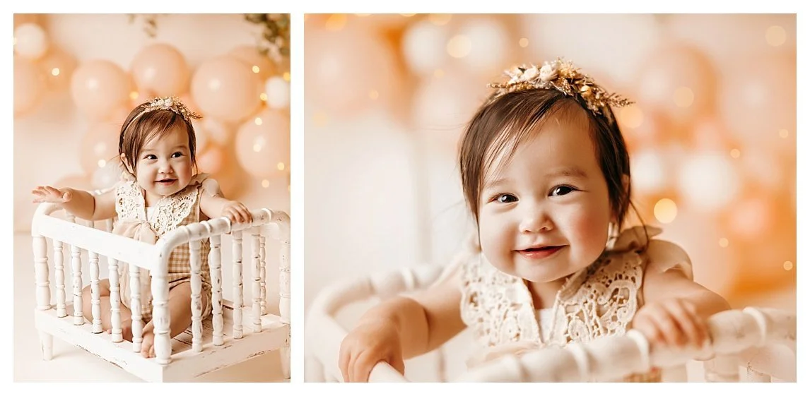 A two-image collage of a smiling baby girl with a floral headband and lace romper; the left side shows her sitting in a white vintage miniature wooden bed, and the right side is a close-up portrait of her bright expression.