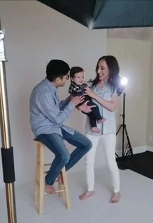 A behind-the-scenes look at a Portland, Oregon studio family portrait session with professional lighting and a baby boy. Perfect for families wanting fine-art heirloom albums and gallery wall displays.