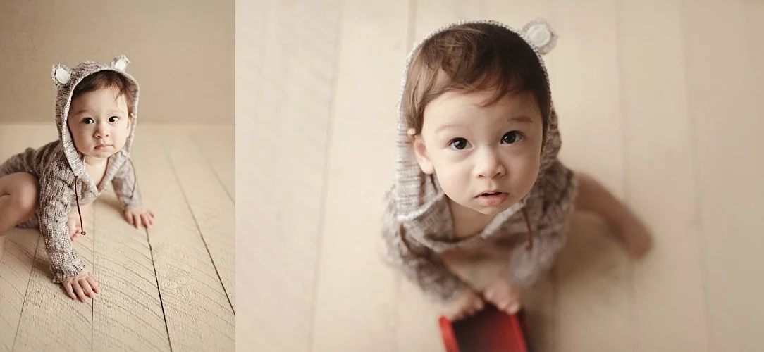A side-by-side milestone collage of an infant in a knit bear-ear hoodie: the left shows the baby crawling on a wooden floor, while the right features a charming overhead close-up.