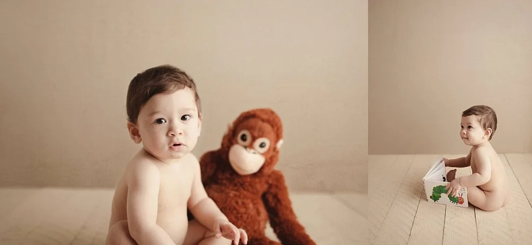 A side-by-side studio collage of a toddler. The left image shows a close-up of the baby sitting next to a plush orangutan; the right captures the baby sitting on a light wooden floor, curiously looking through a "Very Hungry Caterpillar" board book.