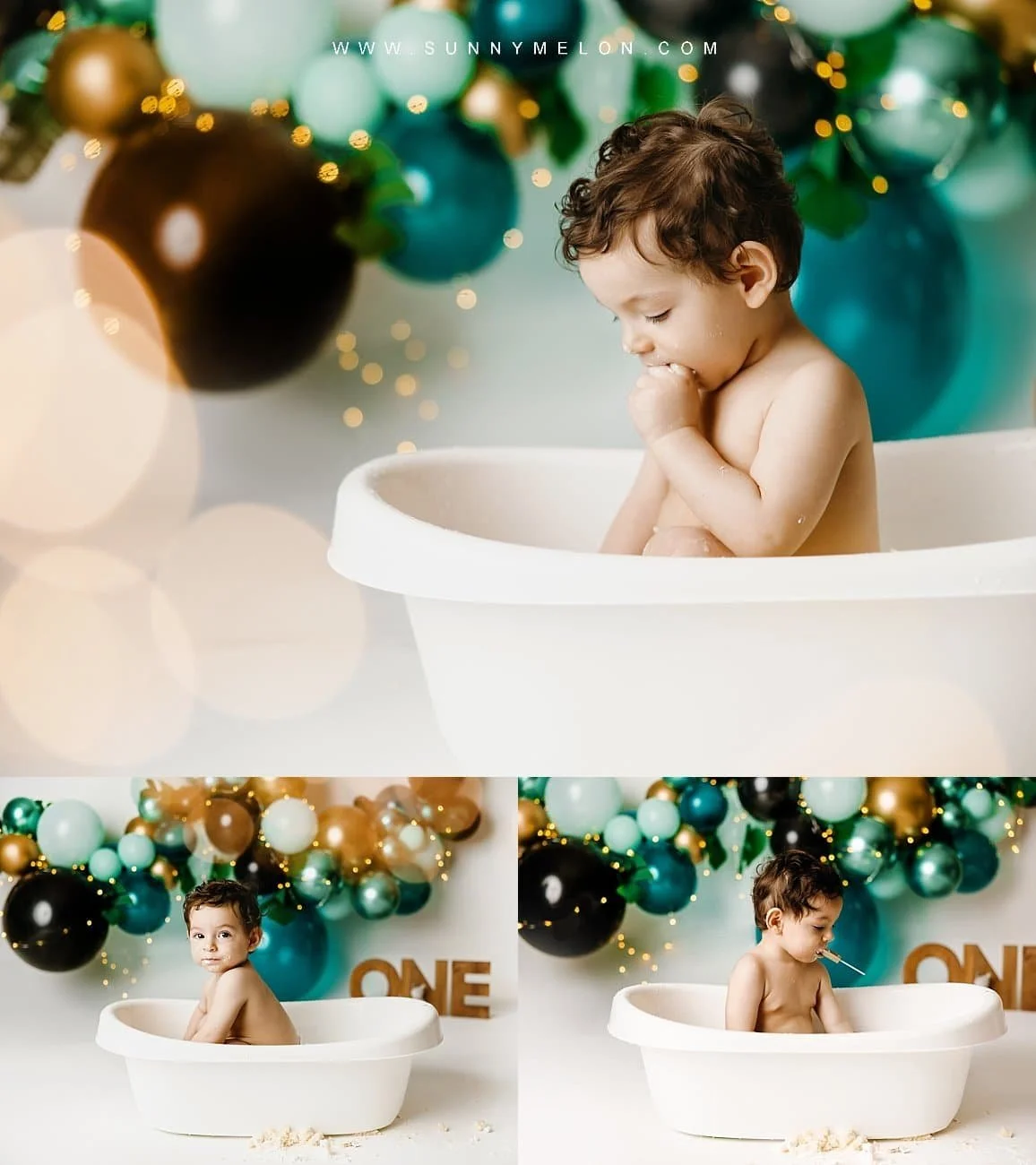 Toddler boy in grey ribbed romper enjoying a blue and gold themed first birthday cake smash.