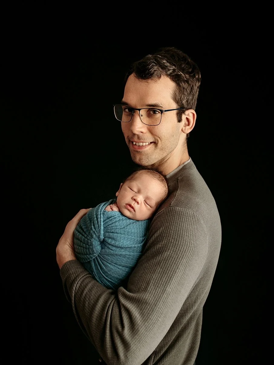 portland-oregon-newborn-photographer-father-holding-baby