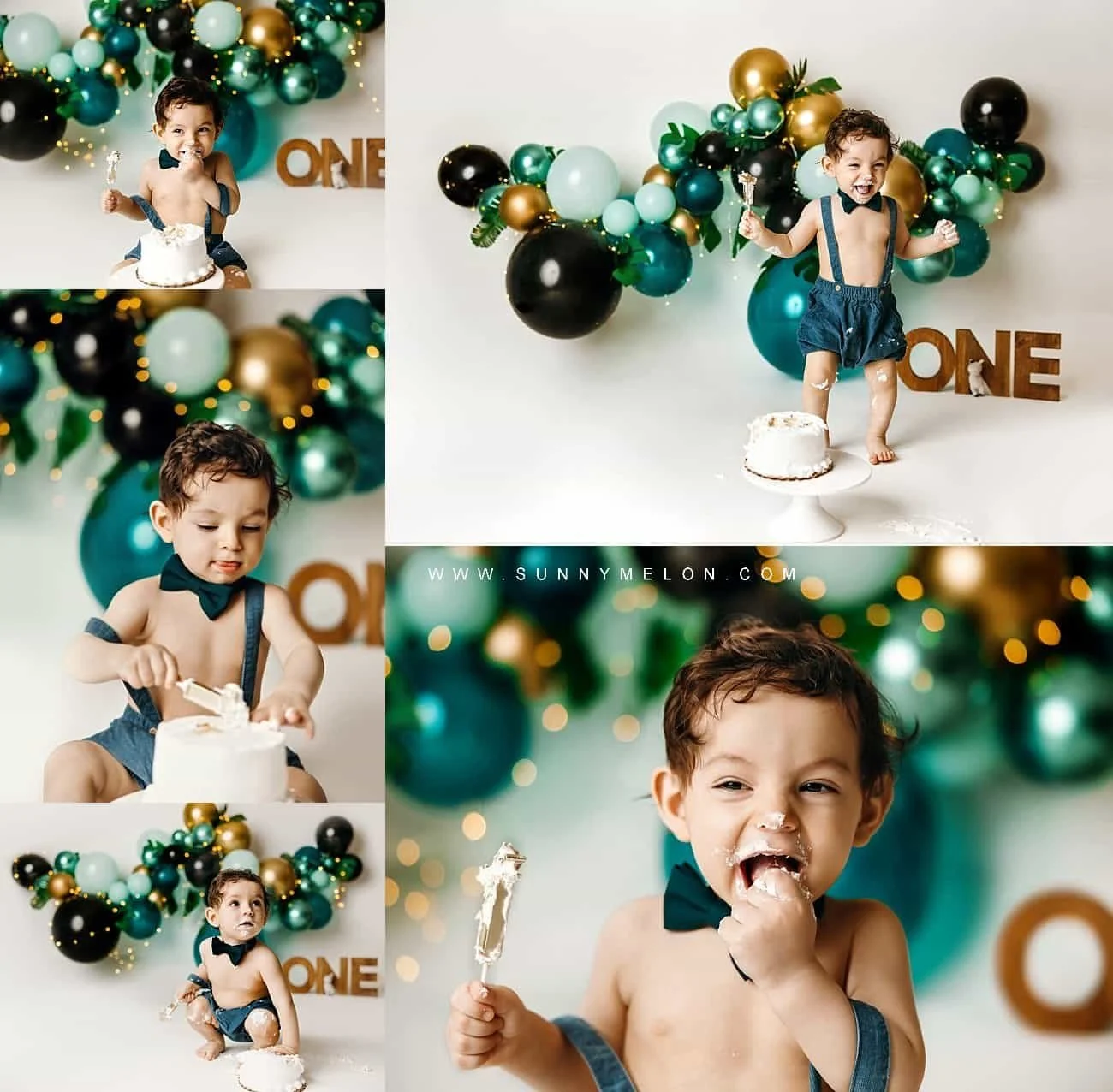 Toddler boy in blue suspender romper celebrating a jungle-themed first birthday cake smash in a studio.