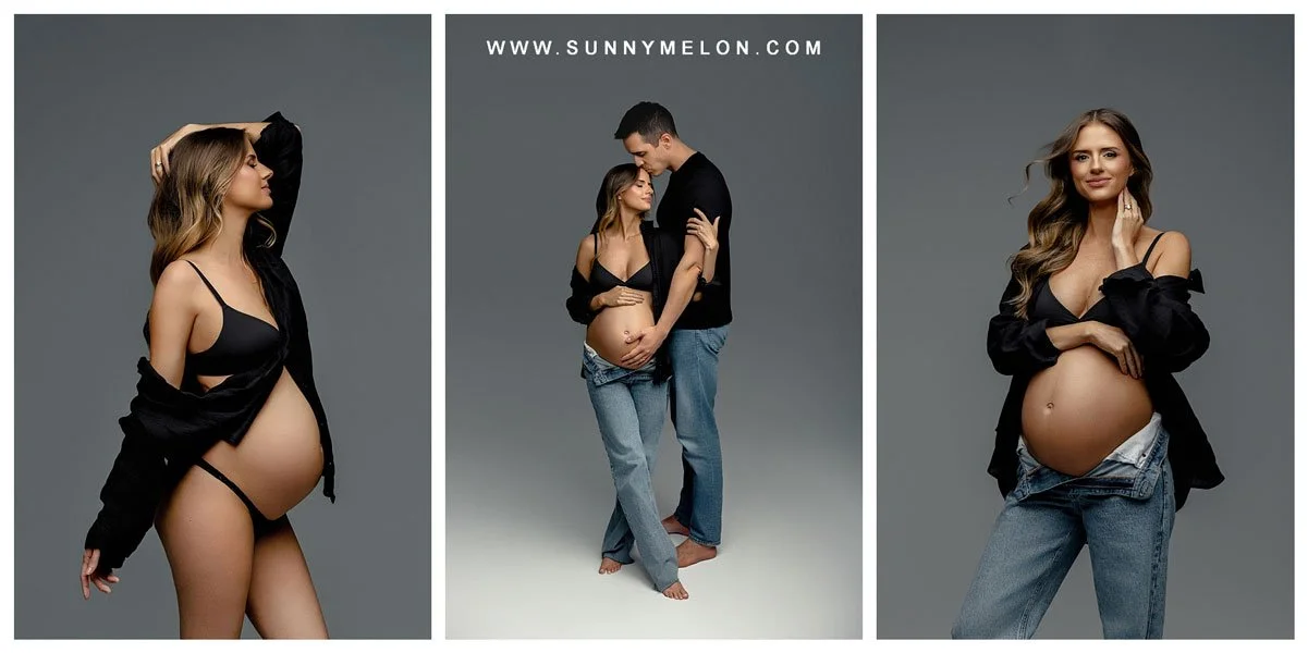 Expectant couple in denim and black attire during a modern studio maternity session.