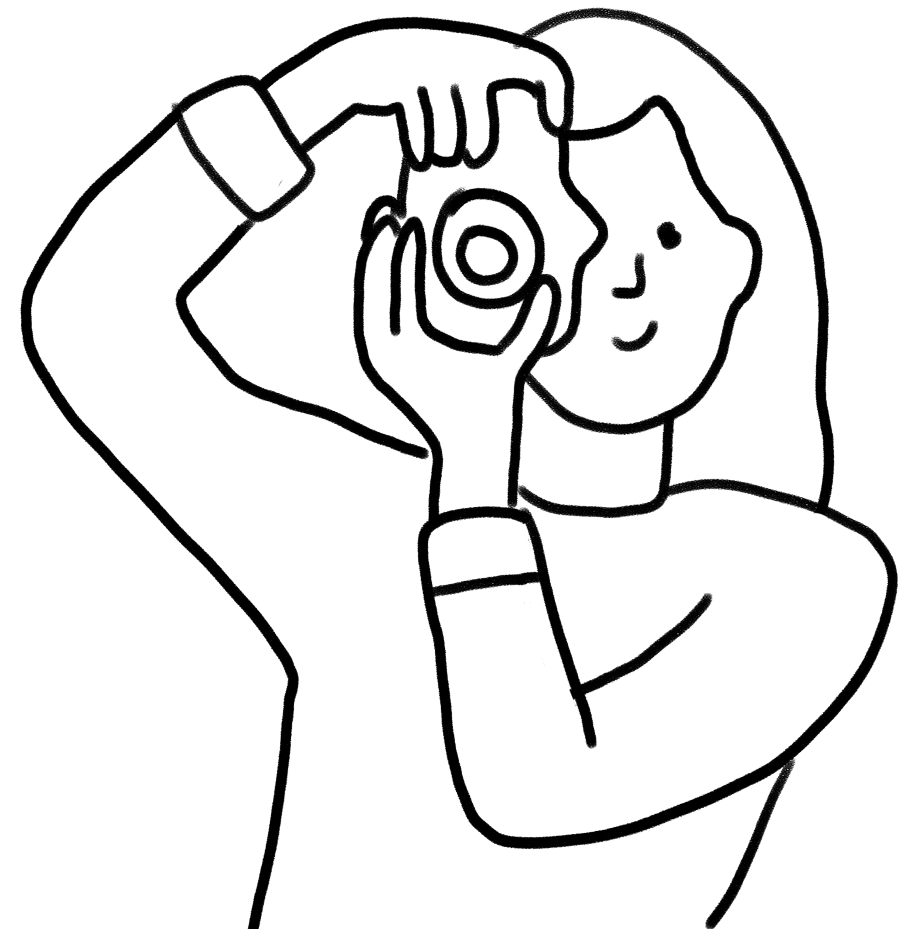 Black and white line art of a female photographer holding a camera to her eye.