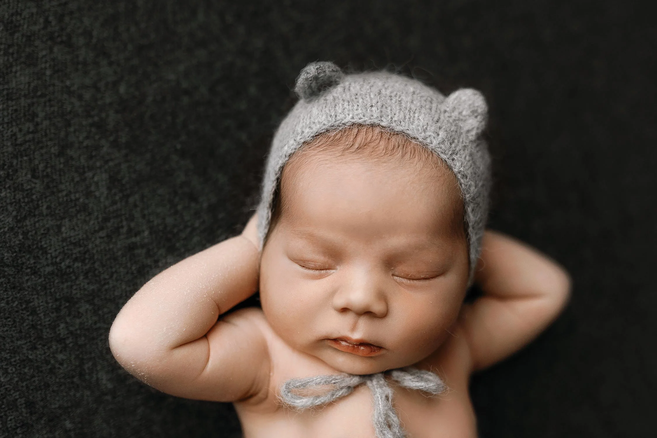 The Art of Cohesive Styling: A Neutral Studio Newborn Session for a Hillsboro Family