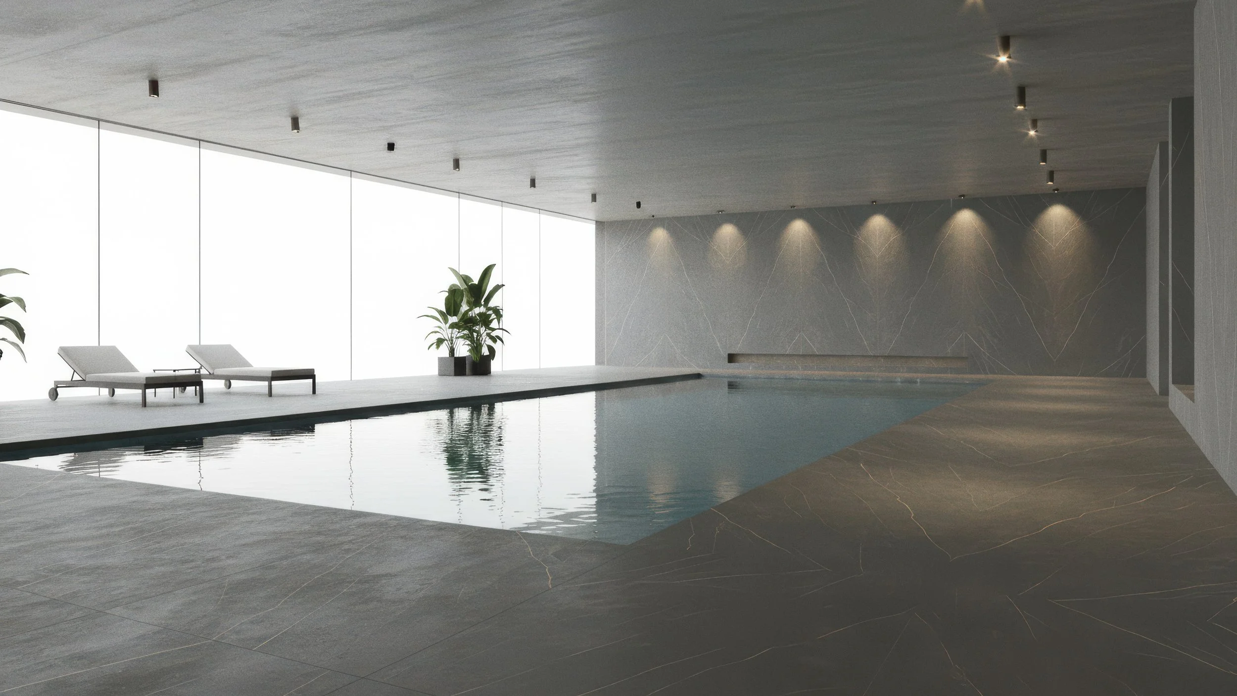 Modern and minimal indoor pool with porcelain slab flooring made with CIERO's 5x10 Gothic Gold Porcelain Slab