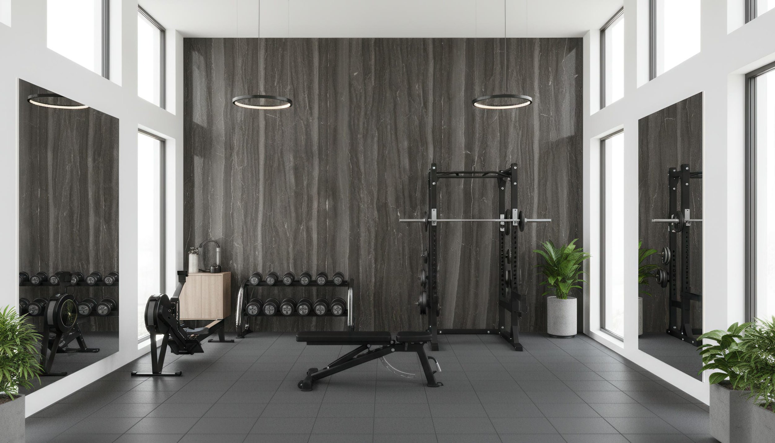 Modern Home Gym with Volcanic Basalt 5x10 Porcelain Slab Featurewall | CIERO