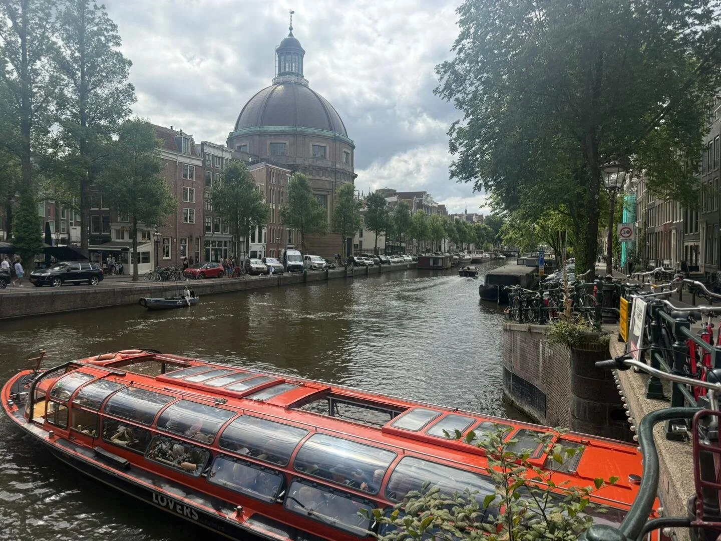The Keopelkerk (Dome Church), also called the Ronde Lutherse Kerk (Round Lutheran Church), Amsterdam, as seen from the Singel Canal of the old city centre, in August 2025