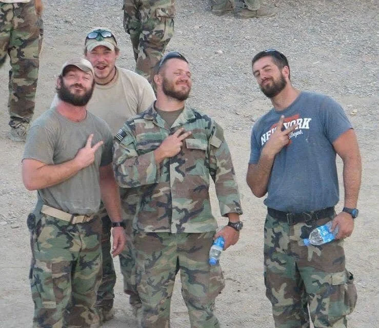 Levi Rodgers walking with his sons