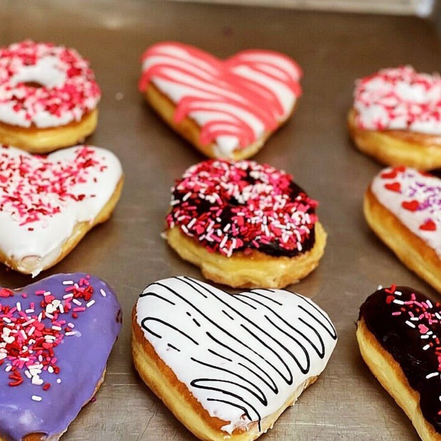 WE WILL HAVE VALENTINES DAY DONUTS ON MONDAY 2/13 AND TUESDAY 2/14!!! 💕❤️💕❤️Come by and grab your sweetheart a HEART ❤️ DONUT! 🌷🌷🌷🌷