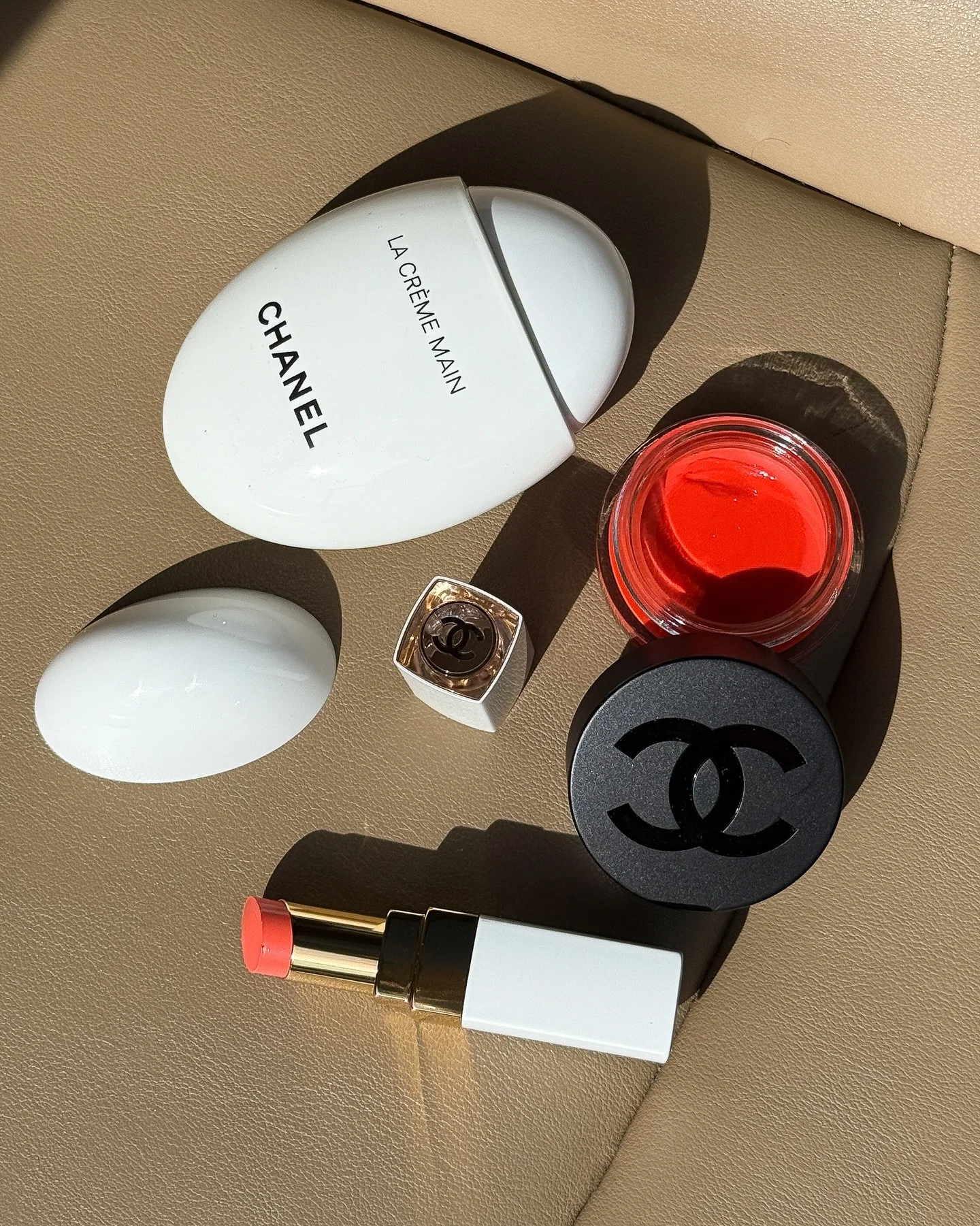 The CHANEL Beauty products we can&rsquo;t leave the house without. What are yours? #welovecoco
(@midnightbee)

&mdash;
LA CR&Egrave;ME MAIN
N&deg;1 DE CHANEL LIP AND CHEEK BALM in Vibrant Coral
ROUGE COCO BAUME SHINE Hydrating Beautifying Tinted Lip 