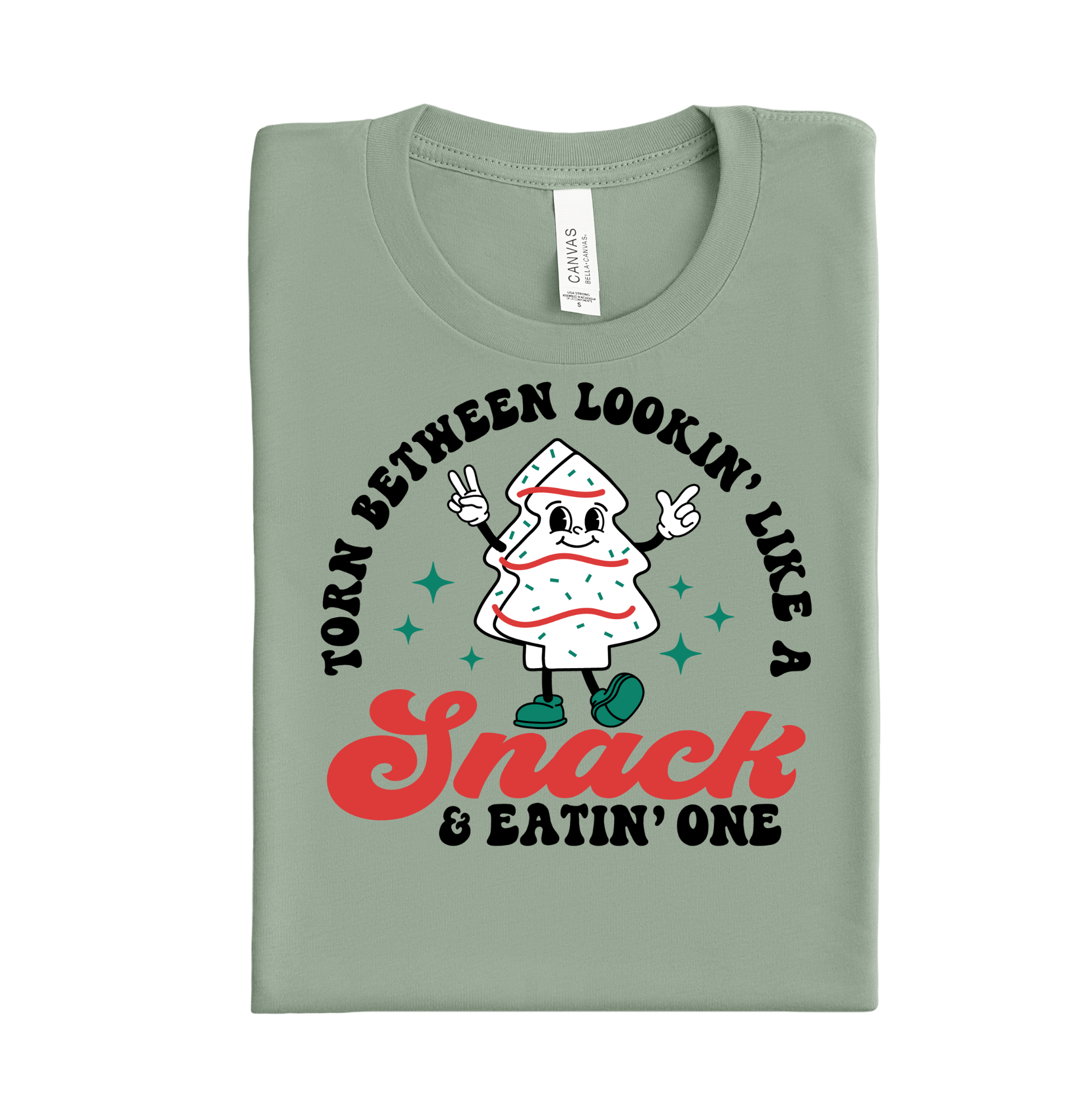 Funny Christmas DTF transfer with the phrase "Torn Between Looking Like a Snack and Eating a Snack" – holiday heat transfer design for shirts and sweatshirts.
