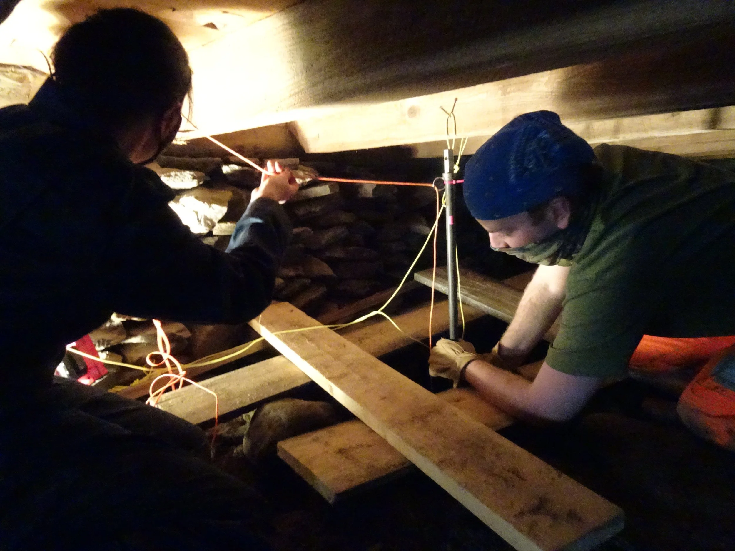 State archeologists checking under the building
