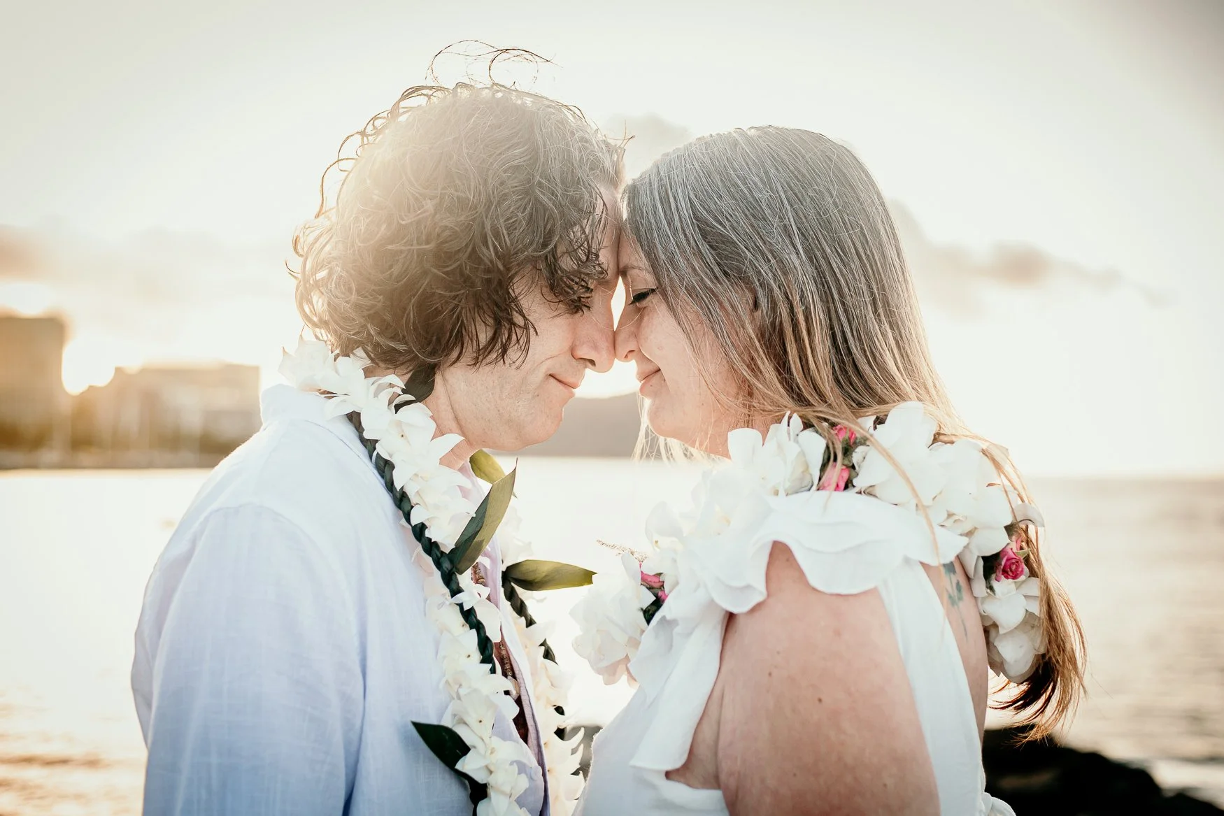 Rebecca and Nate married at Magic Island Beach Park in Honolulu, Hawaii.