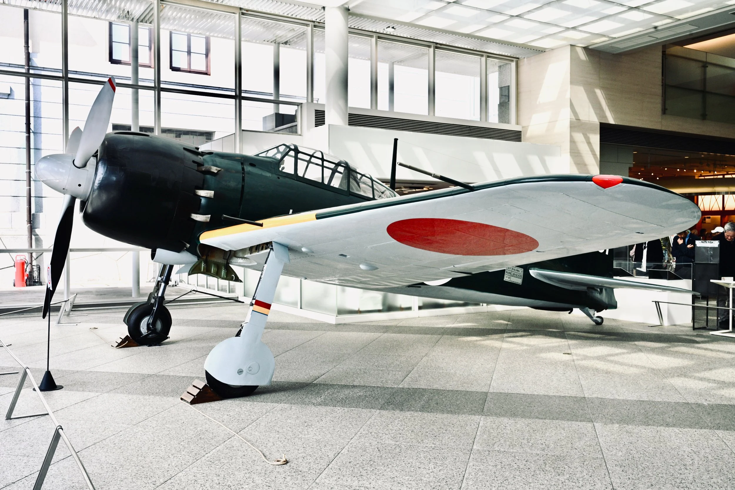 For history enthusiasts, here’s the remarkable Mitsubishi A6M Zero in pristine condition. Allied intelligence doubted such an aircraft was even possible. It was faster than the Spitfire and Messerschmitt, had exceptional range, and could operate from
