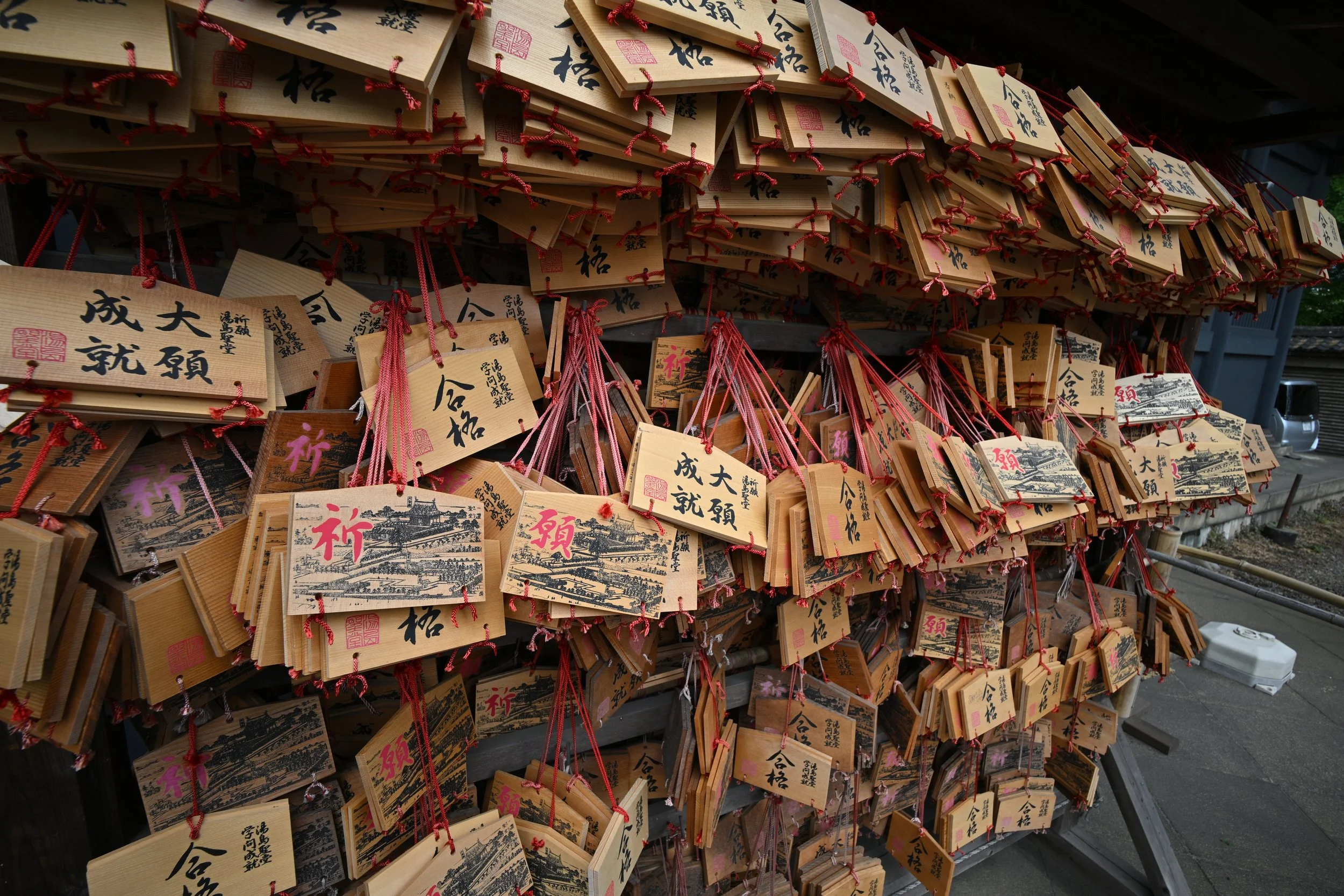 During exams, many students flock to Yushima Seido to pray for success in their exams!  Japanese wooden prayer cards, known as Emaare traditional votive tablets found at Shinto shrines and Buddhist temples where visitors write wishes, prayers, or gra