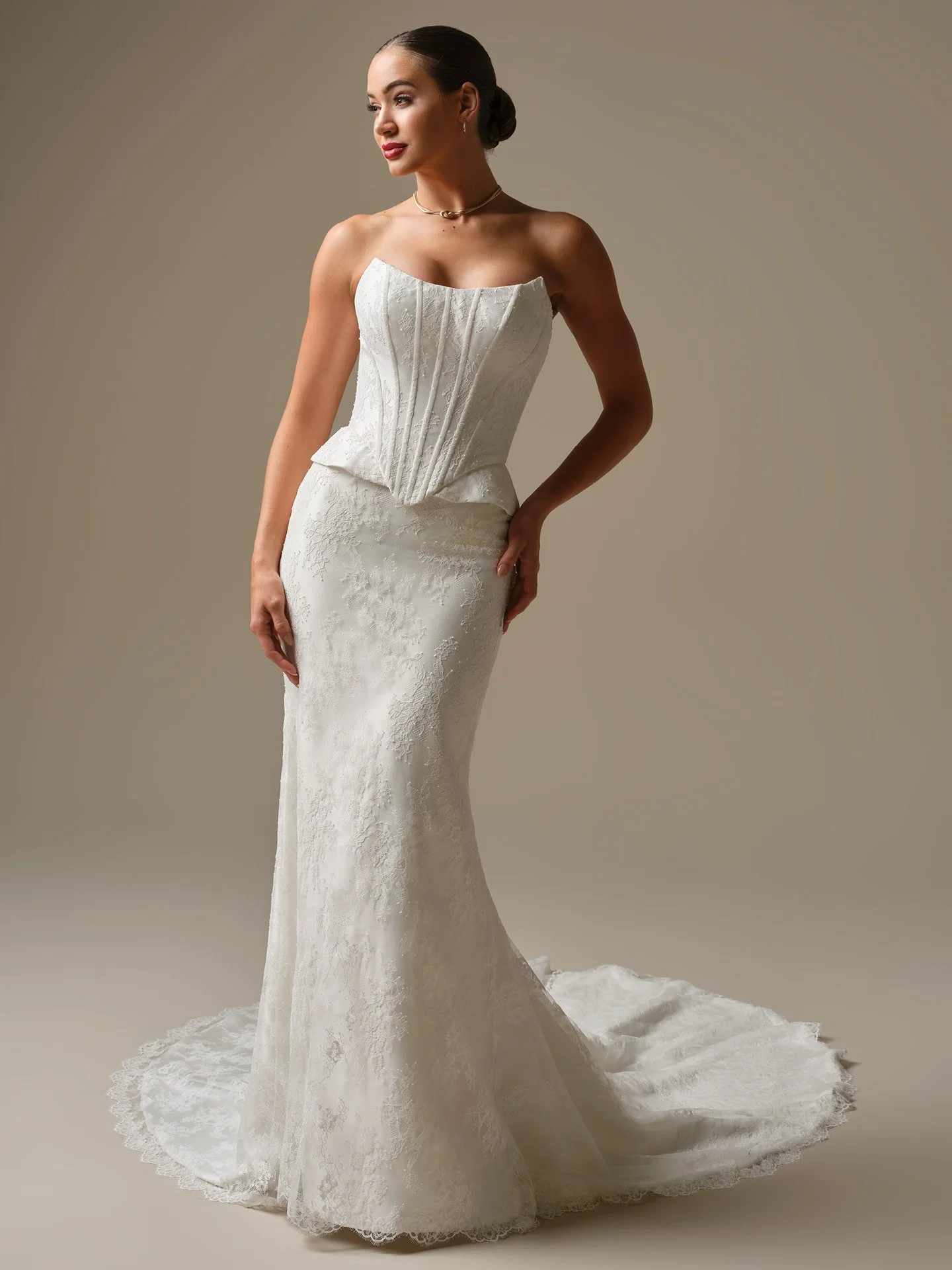Also available - Lassen
Unembellished Chantilly lace bridal bodice accessory with covered buttons and corset closure
