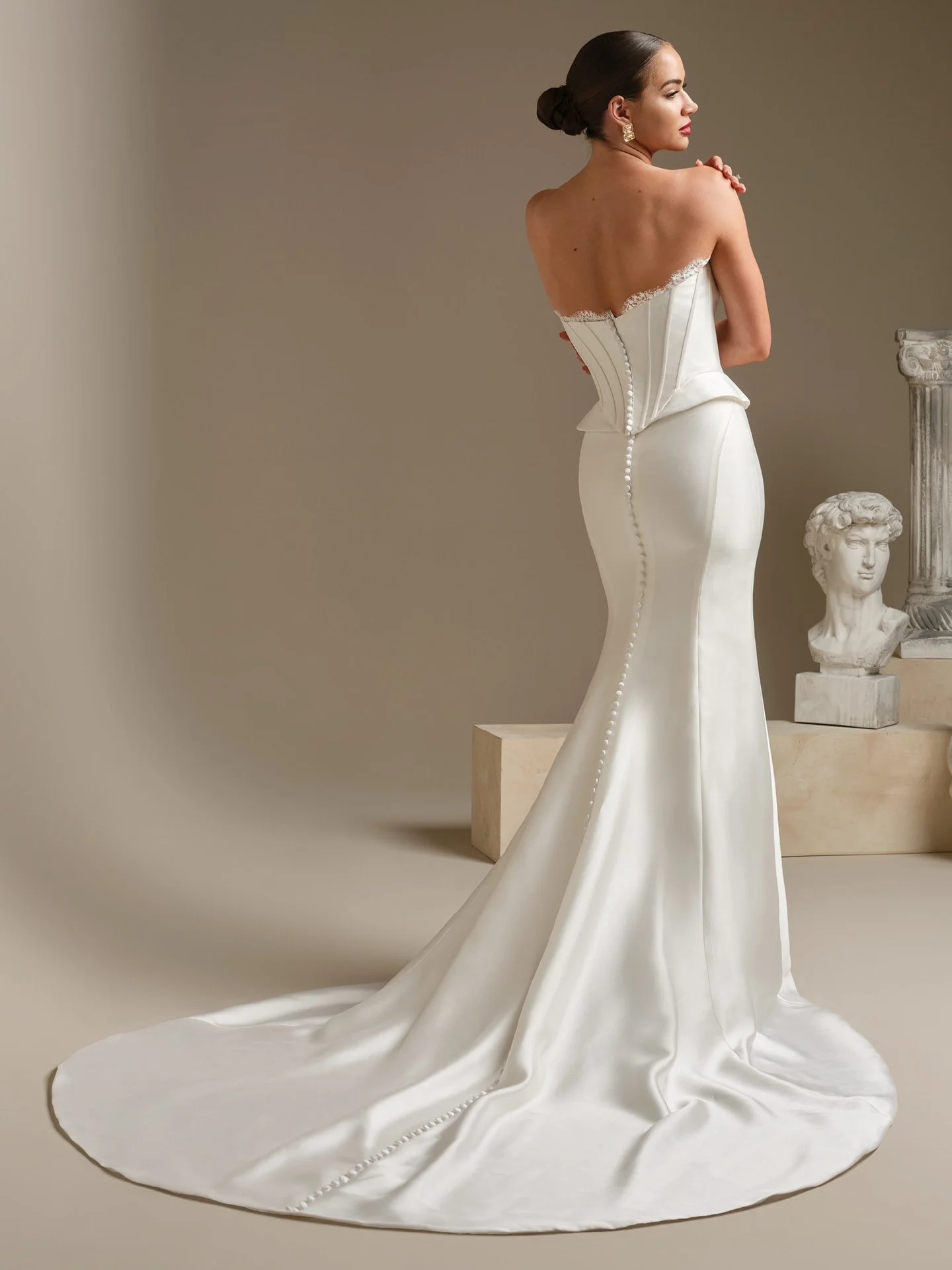 Two-piece bodice with corset boning and peplum accents at the hips