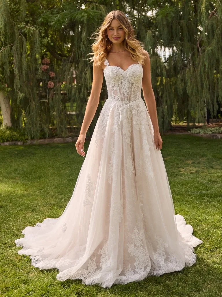 Light A-Line wedding dress, Covered in elegant lace. 
