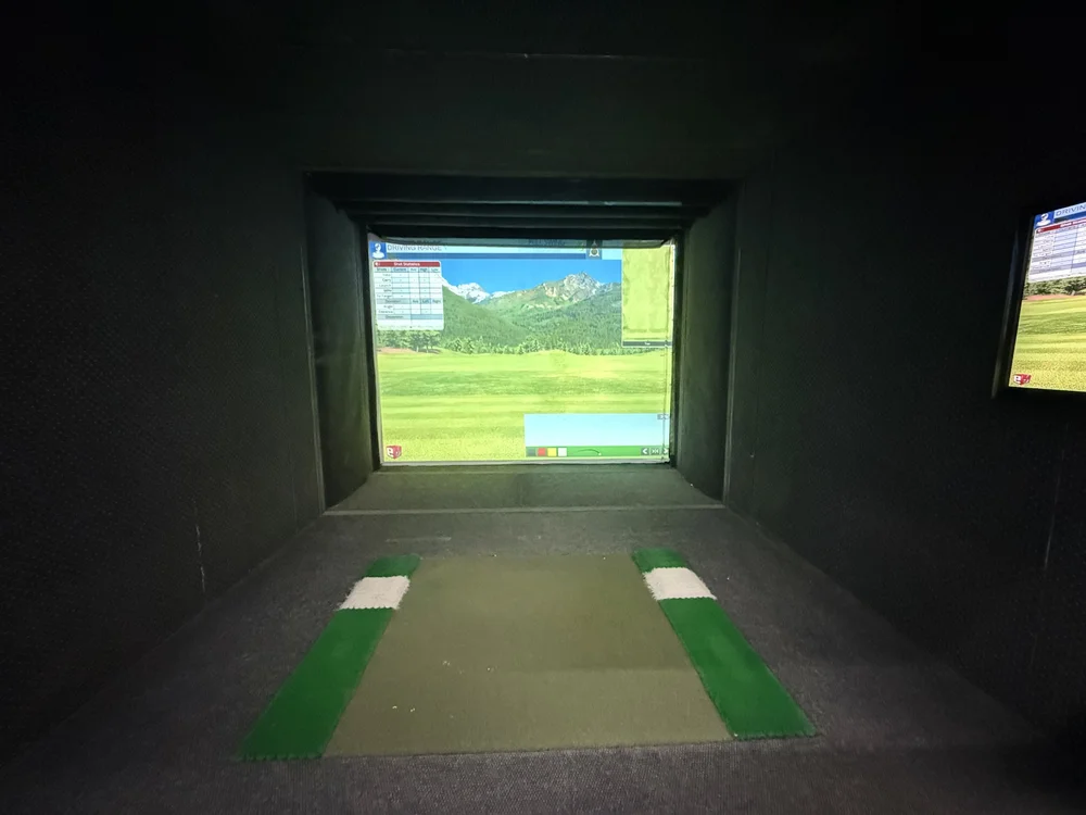 One of Swing Zone's indoor golf simulator bays
