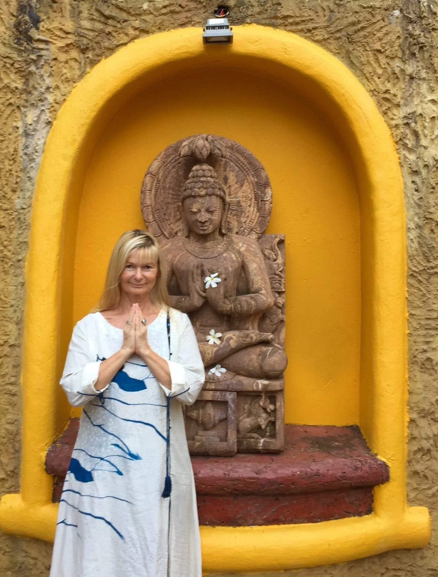 Mila, co-founder and head yogi at Samudra Retreats, leading a breathwork and sound meditation in the ancient stone cave