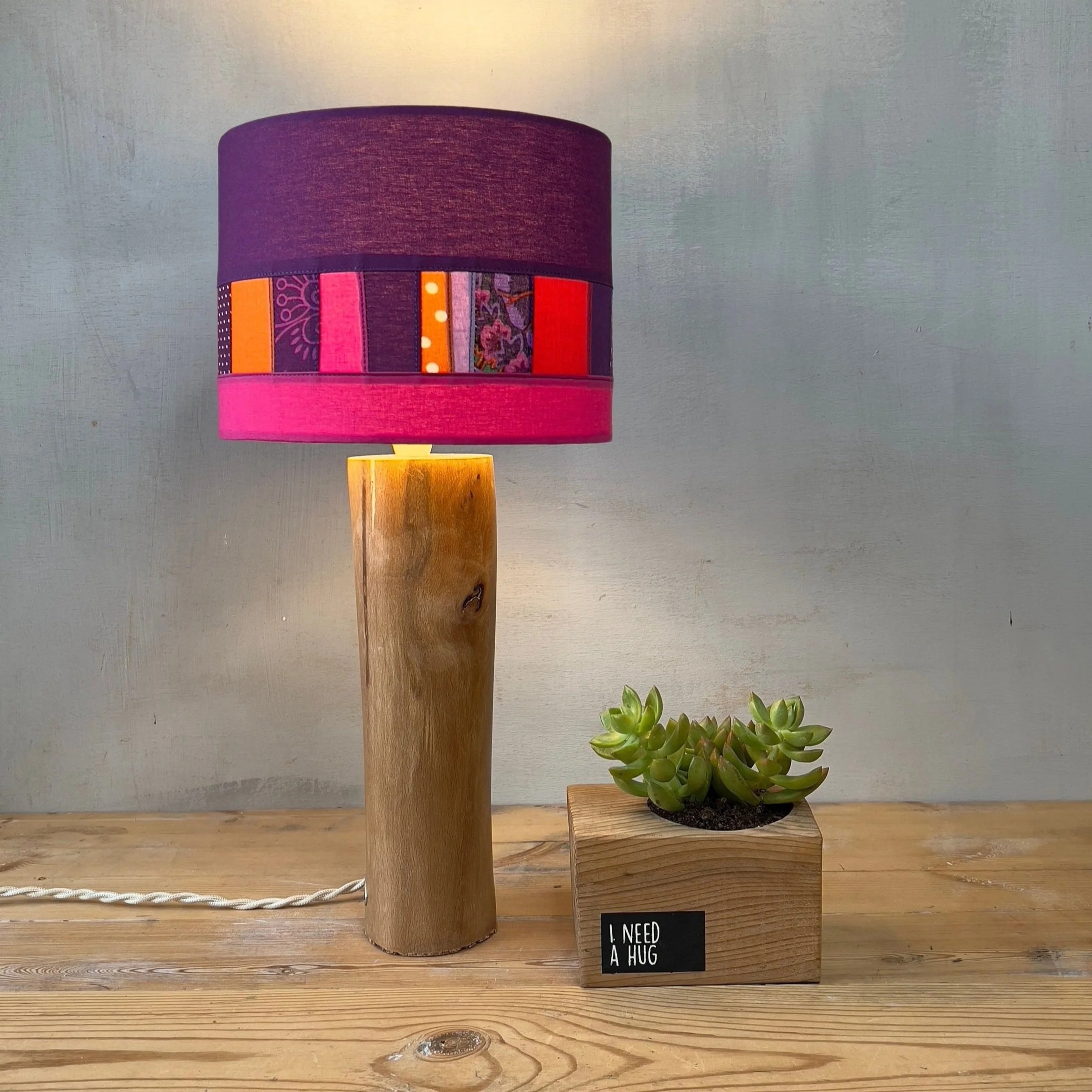 Patchwork wood lamp lit