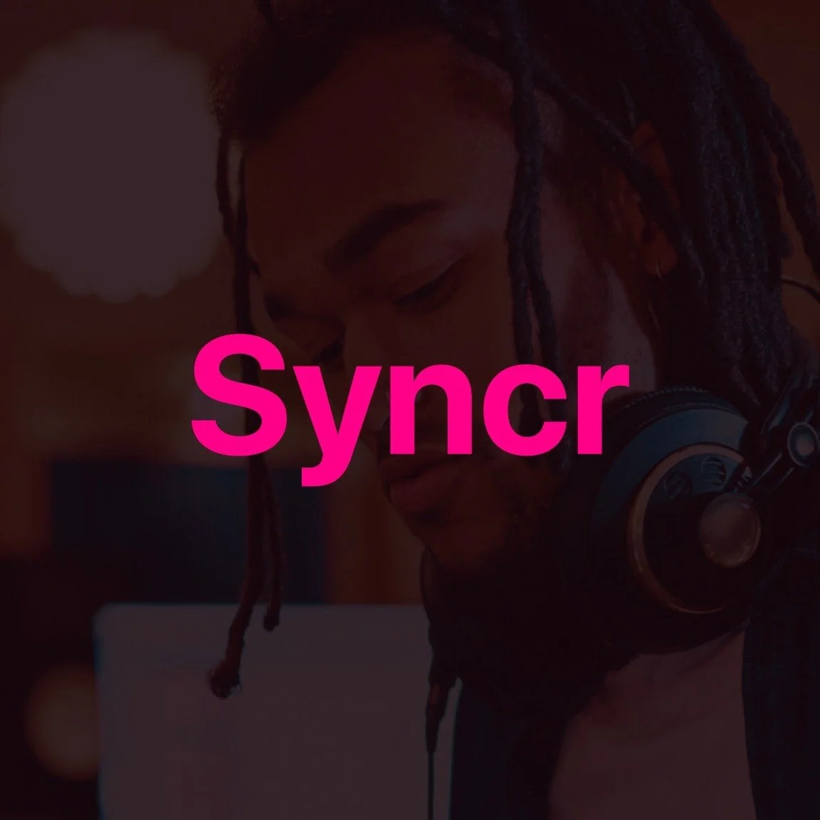 A person with dreadlocks is wearing headphones and looking down. The word 'Syncr' in pink text overlays the image.