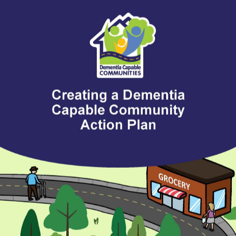 A train track stretching into the distance. On the left there are trees with fall colours and on the right there are three midrise apartment buildings overlooking the tracks.