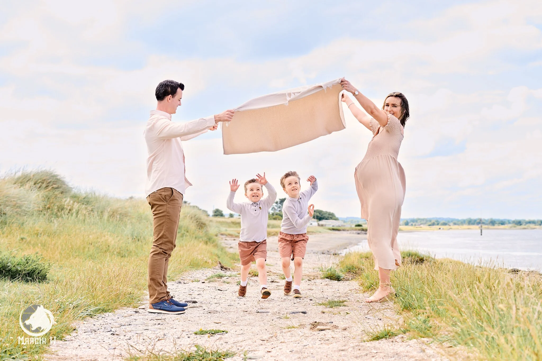 Parents and children enjoying an outdoor photoshoot