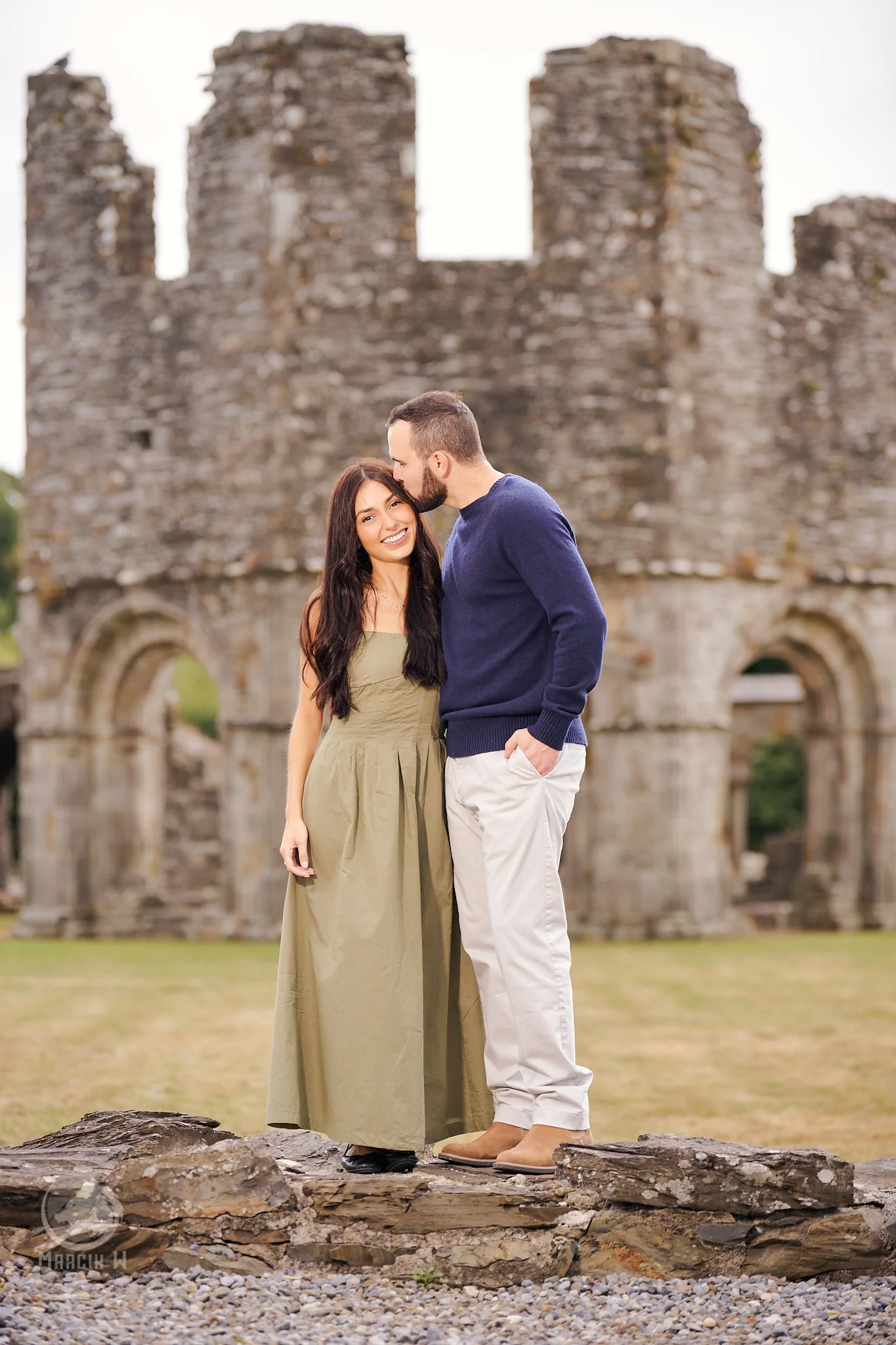 Romantic engagement portrait of Keegan and Bailey at Old Mellifont Abbey, County Louth, Ireland, during their destination engagement photography session with Marcin W Photography.