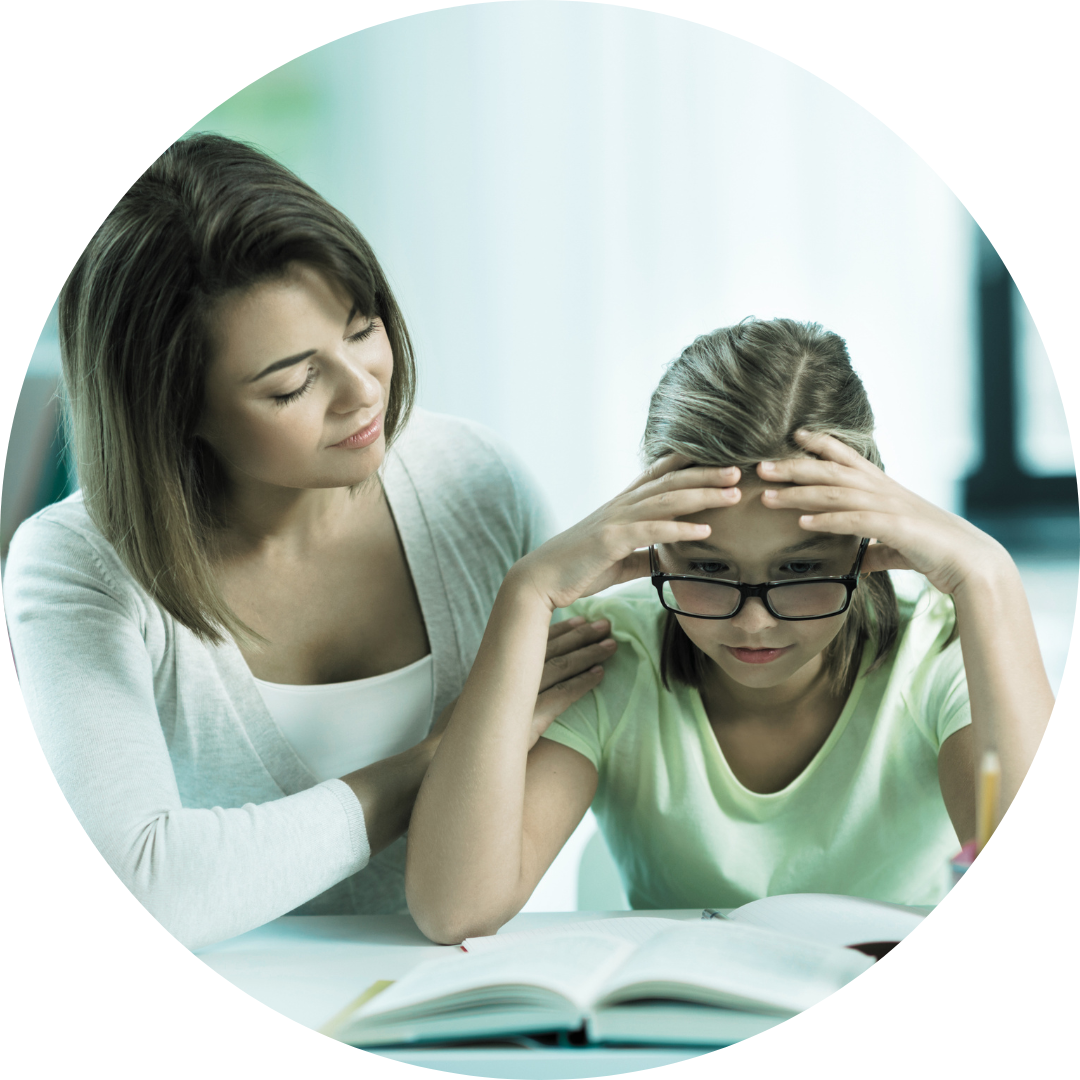 Mom helping frustrated daughter with homework
