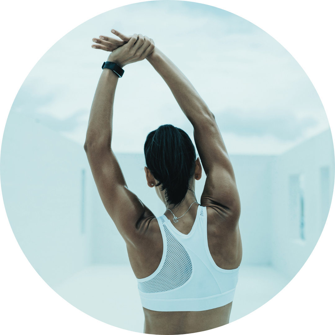 Woman working out and stretching arms