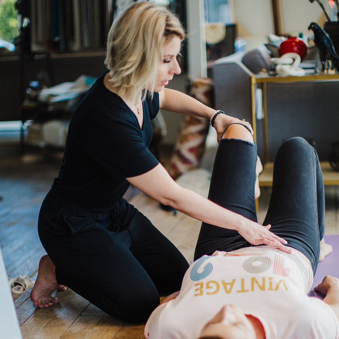 Kim Deschamps physiotherapist treating a client