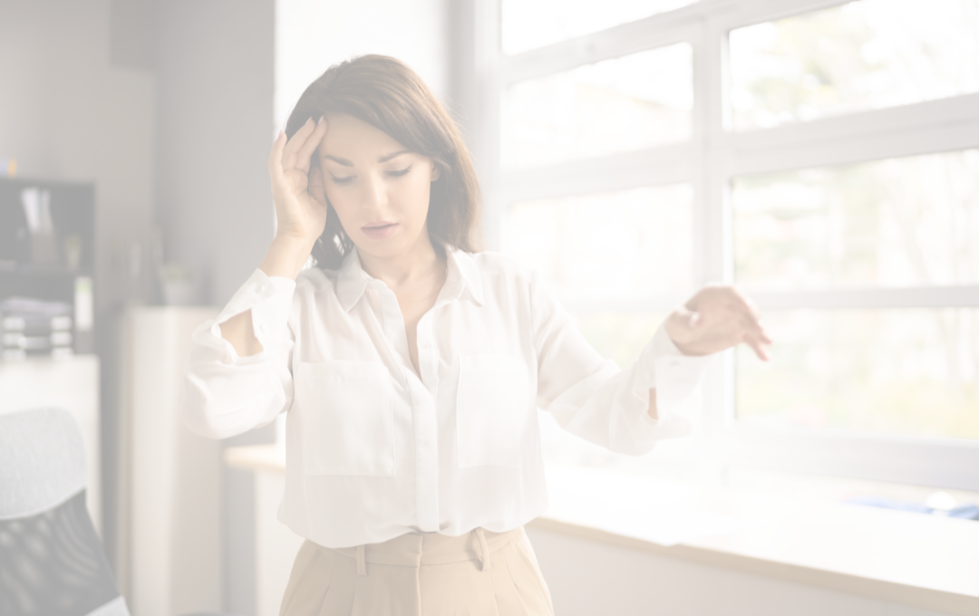woman suffering from vertigo and dizziness
