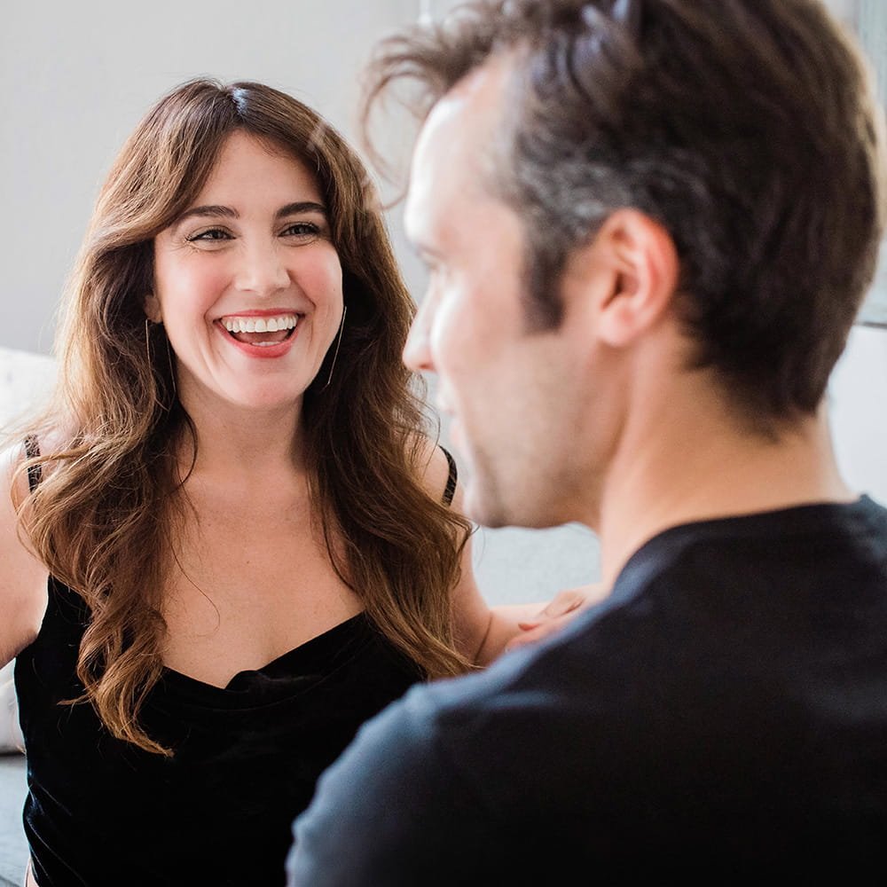 Megan Paige smiling warmly during a 1:1 relationship coaching conversation