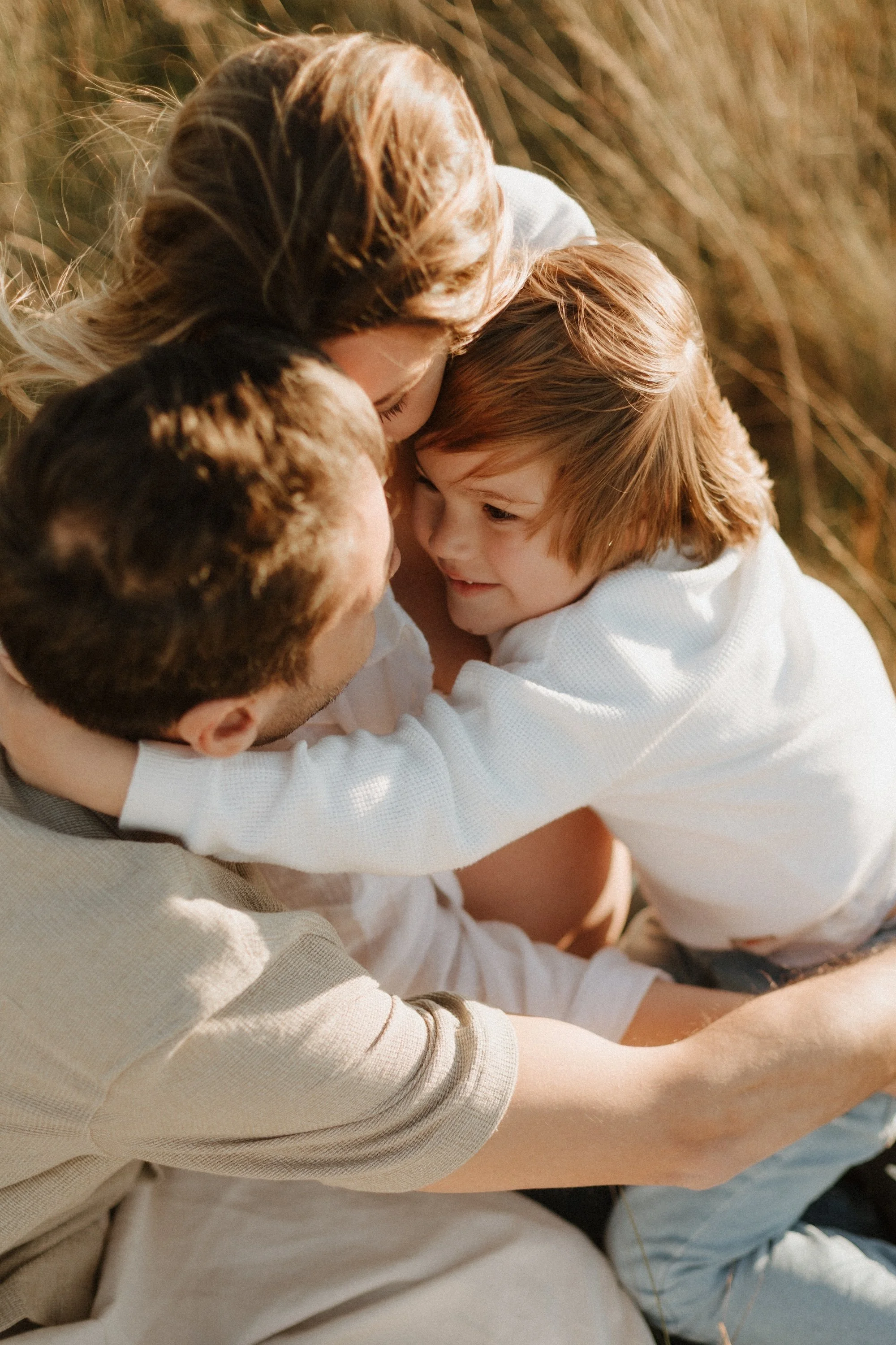 Family enjoying a natural photoshoot outdoors in the Spring at Sunset in Girona, Spain
