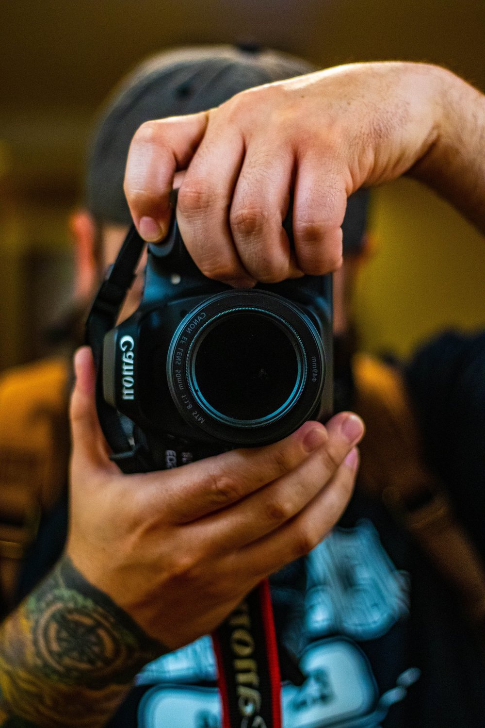 Tristian Belice holding a camera