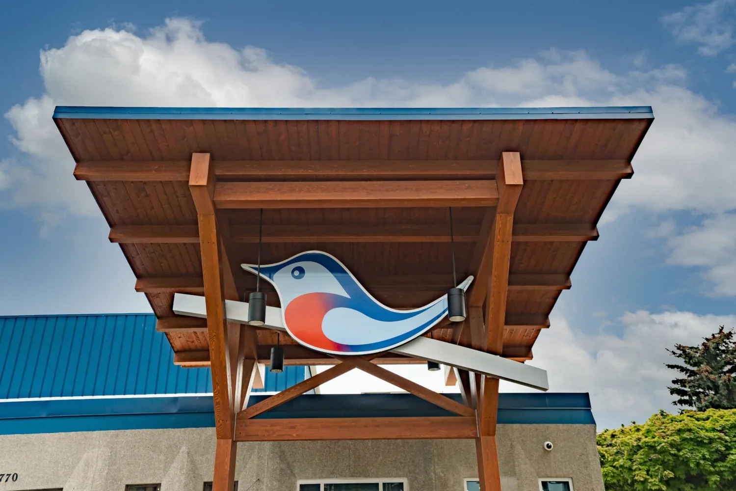 Bluebird Self Storage entrance sign and facility