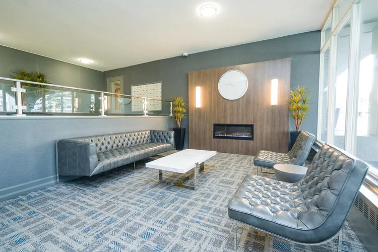 Renovated lobby with a fireplace wall in a Homestead apartment building