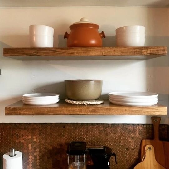 Silver maple with a gorgeous stain and double bevel edges. A perfect match with the copper penny backsplash.