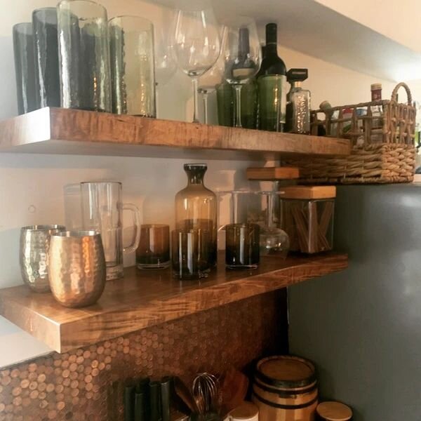 Kiss your old Ikea shelves goodbye and toss them into a flaming dumpster fire. Make the right move and go for the gorgeous wood vibe like this Toronto Junction kitchen did.