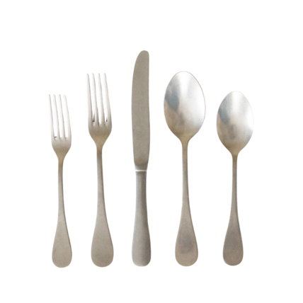 A set of four forks and two spoons with a knife in the middle, all made of stainless steel, arranged on a plain background.