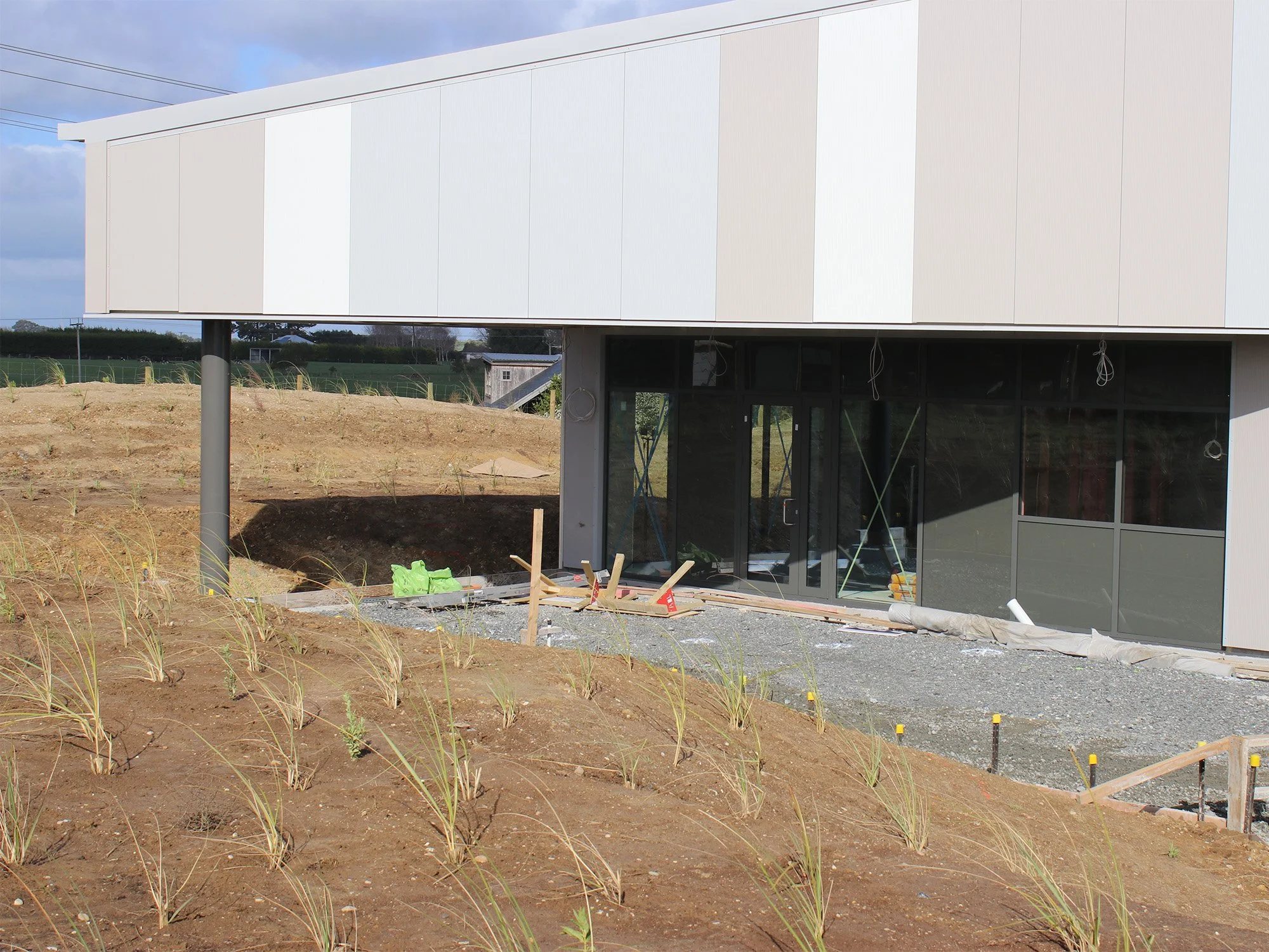 The front entrance doors and windows to the Tisbury storage facility have been installed this week as the final touches are being made to the outside of the building.